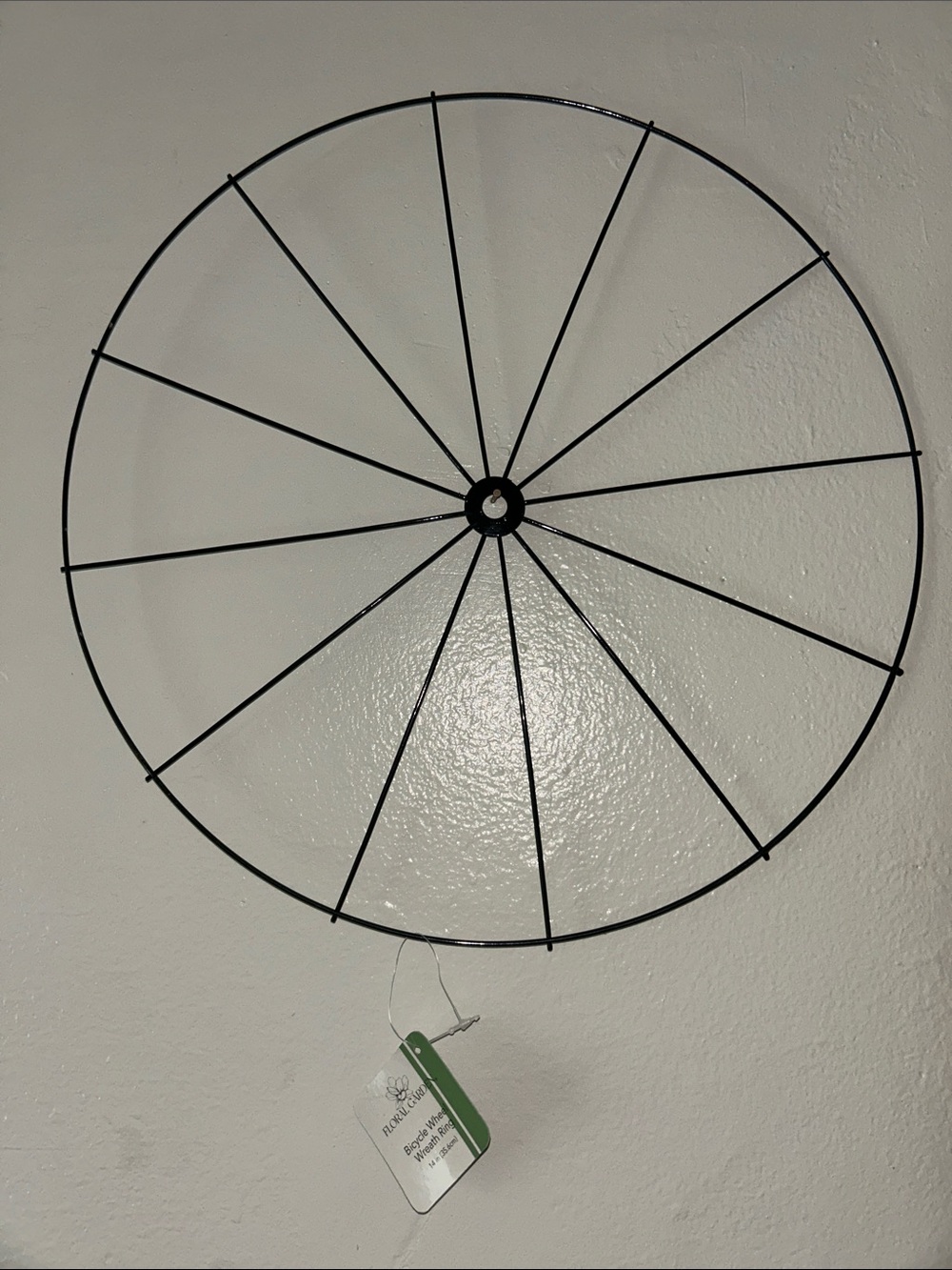 Black Metal Wheel Wall Decor - Rustic Geometric Accent